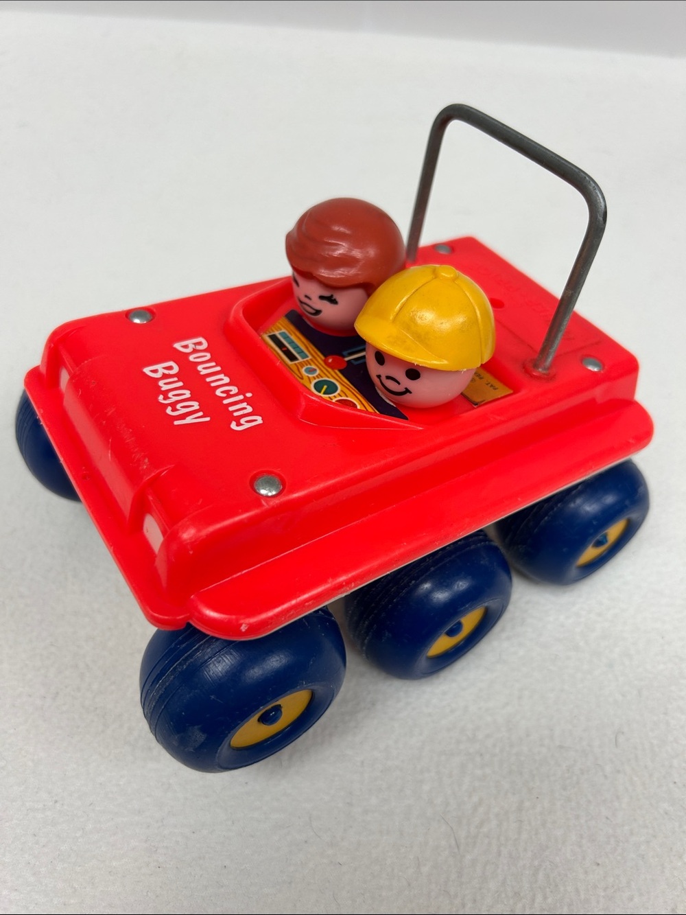 Vintage 1973 FISHER PRICE #122 “Bouncing Buggy” plastic pull toy made in USA